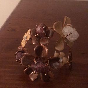 Gorgeous cuff braclet with colored stones .